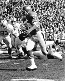 photo of Walter Payton running with football