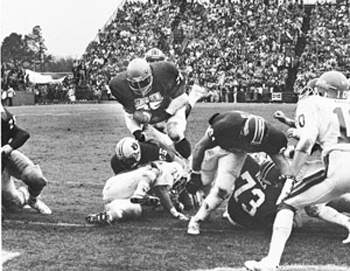 photo of Christian Okoye running with football