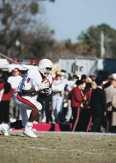 photo of Thurman Thomas running with football