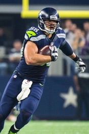 Jimmy Graham photo running with football